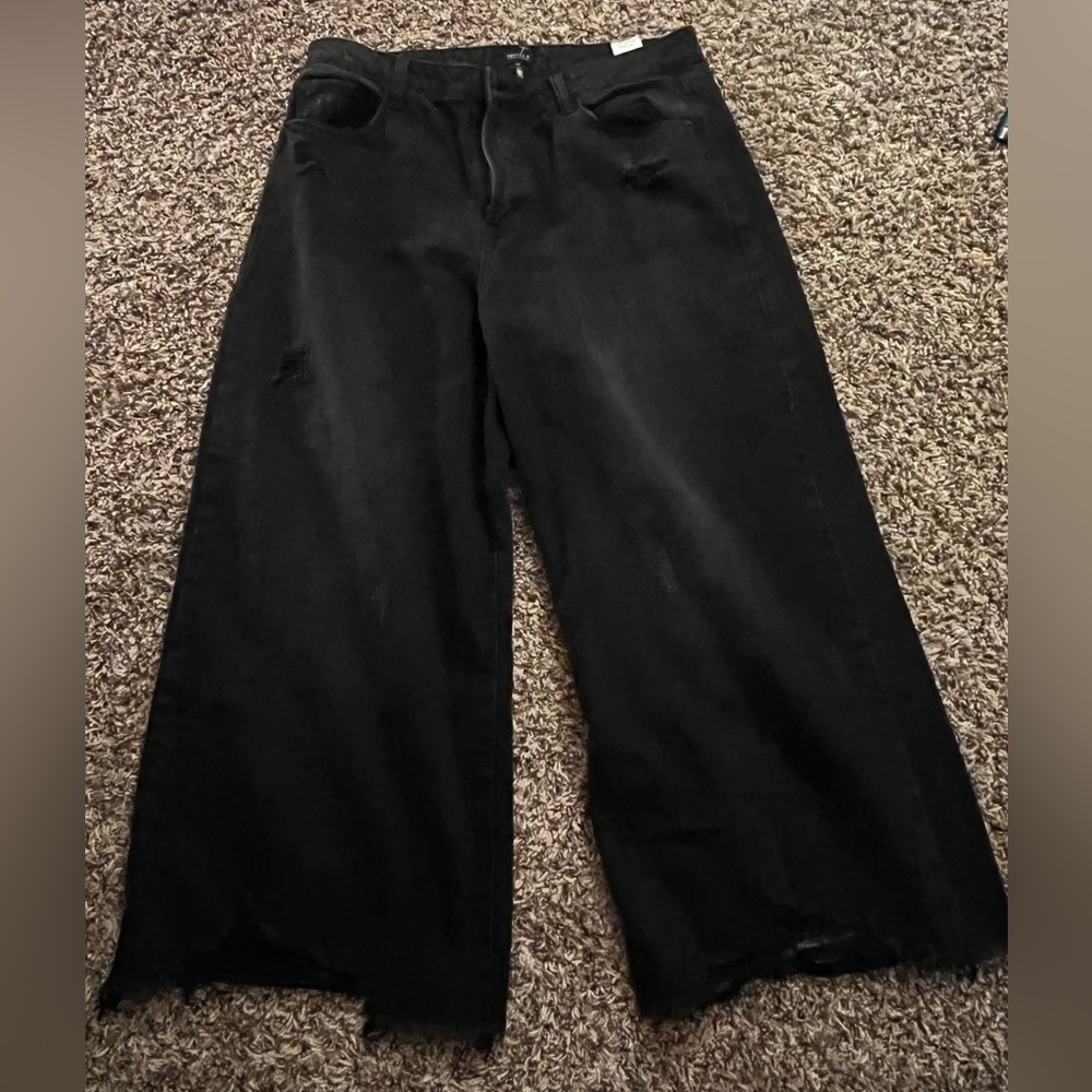 Black super wide leg Special A jeans.